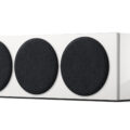 reference_2_meta_perspective_front_grille_on_high_gloss_white_champagne