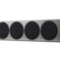 reference_4_meta_perspective_front_grille_on_satin_walnut_silver
